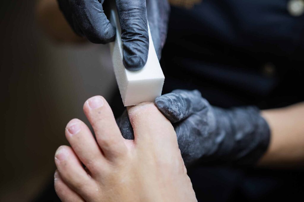 Pediküre Shellack-Entfernung